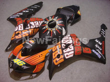 Bild in der Galerieansicht laden, Matte Black and Orange  Rossi - CBR1000RR 06-07 Fairing Kit